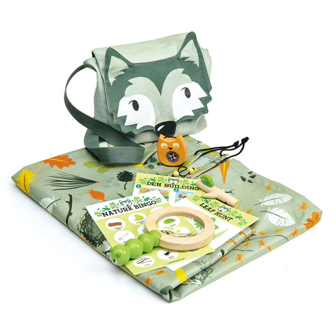 Children’s forest trail kit in wolf canvas bag with waterproof groundsheet, magnifying glass, compass and trail cards.