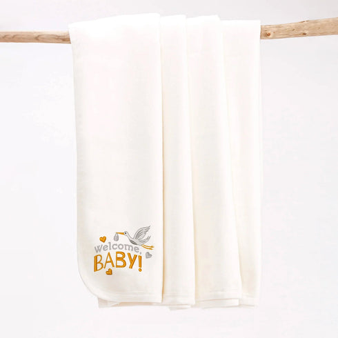100 % organic Prima Cotton infant blanket with embroidered stork detail—cozy, hypoallergenic, ideal for newborn gifting