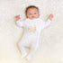 Soft cotton baby onesie in calming color, side snap closures for easy dressing, perfect for comfortable sleep.