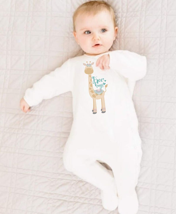 Boho-style newborn sleeping romper with a giraffe "Free Hugs" design, made from soft Prima Cotton