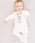 Boho-style newborn sleeping romper with a giraffe "Free Hugs" design, made from soft Prima Cotton