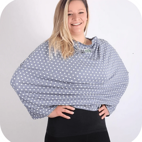 Woman wearing Mama Bamboo grey polka dot multi-use nursing cover, available at Calm Nest for stylish feeding privacy.