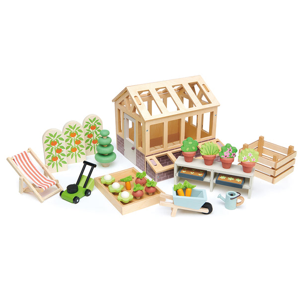 Tender Leaf style greenhouse and garden playset: wooden frame, seed trays, watering can, wheelbarrow, plants for ages 3+.