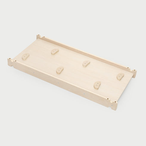 Natural wood freestanding climbing board with multiple colored holds, adjustable tilt for strength and balance training at home.